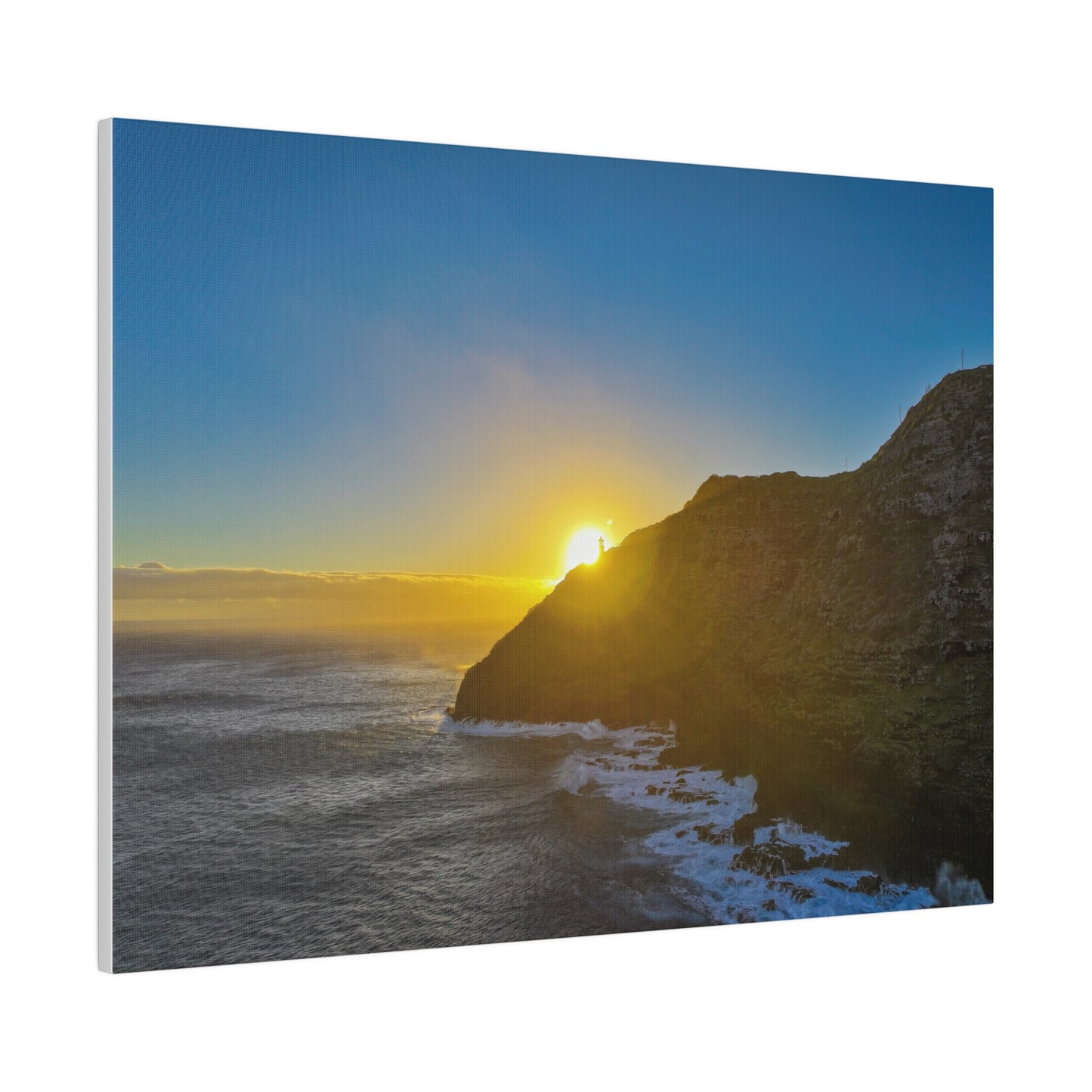 Sunrise Peaking Over Lighthouse