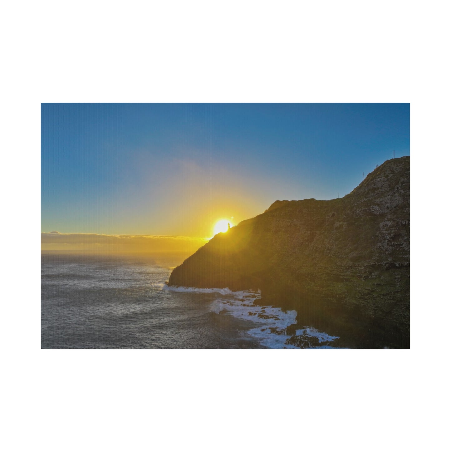 Sunrise Peaking Over Lighthouse