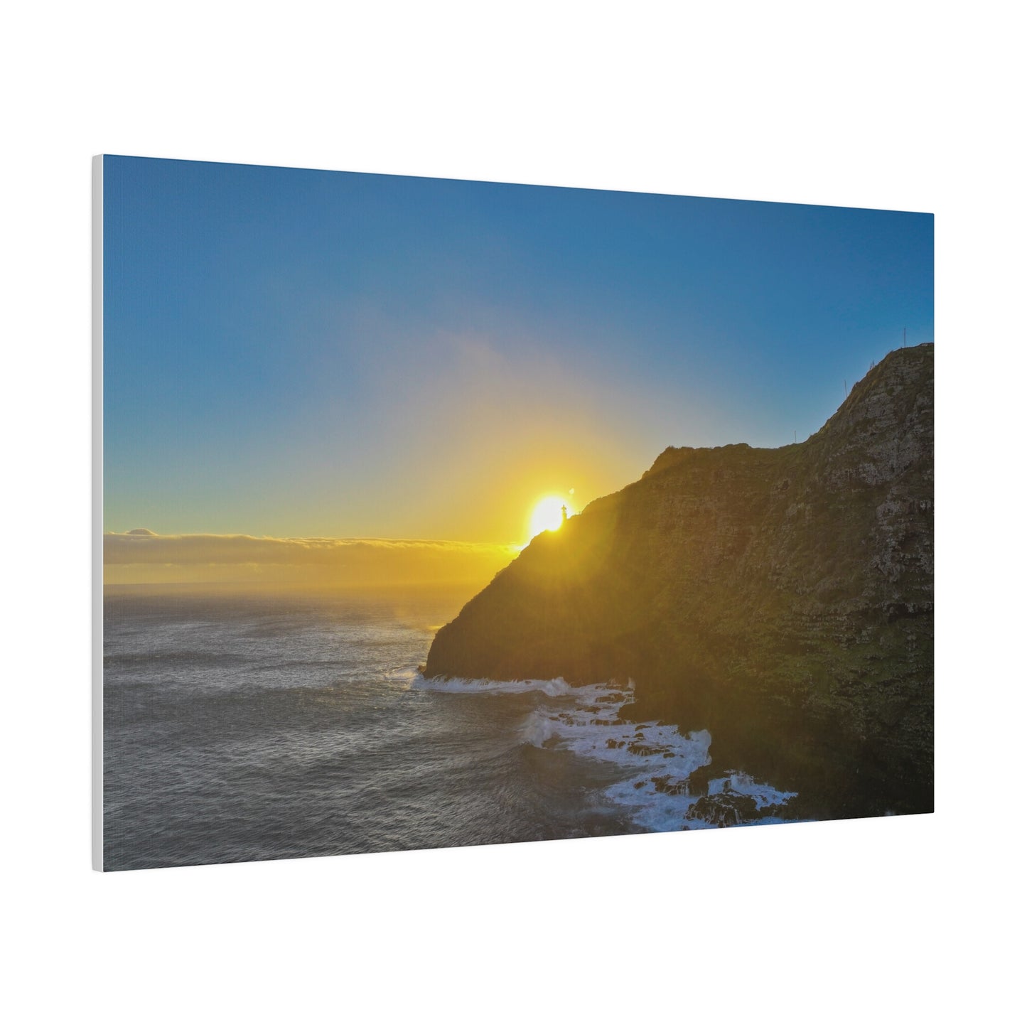 Sunrise Peaking Over Lighthouse