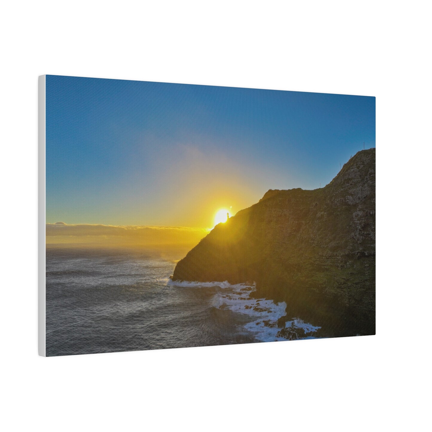 Sunrise Peaking Over Lighthouse